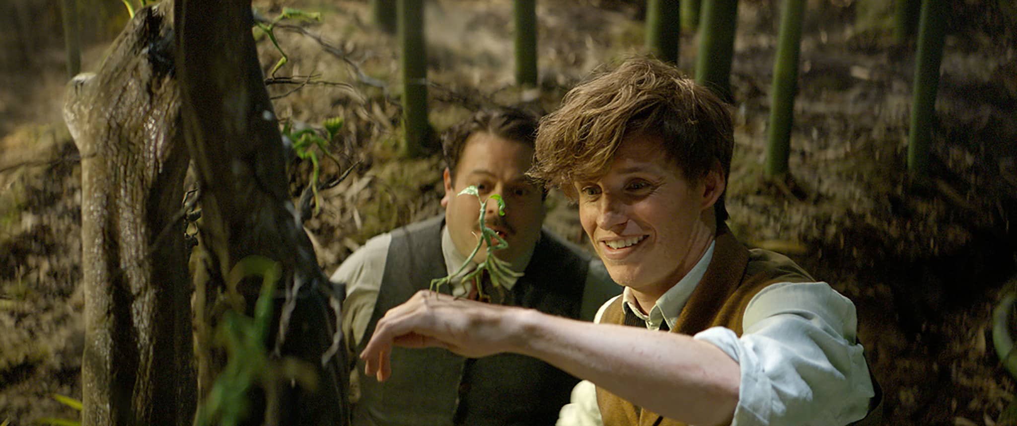 Dan Fogler and Eddie Redmayne in this image from Warner Bros. Pictures