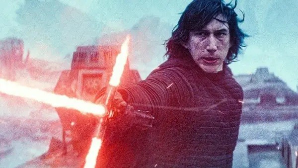 A man dressed in all black with a red lightsaber in this image from Lucasfilm