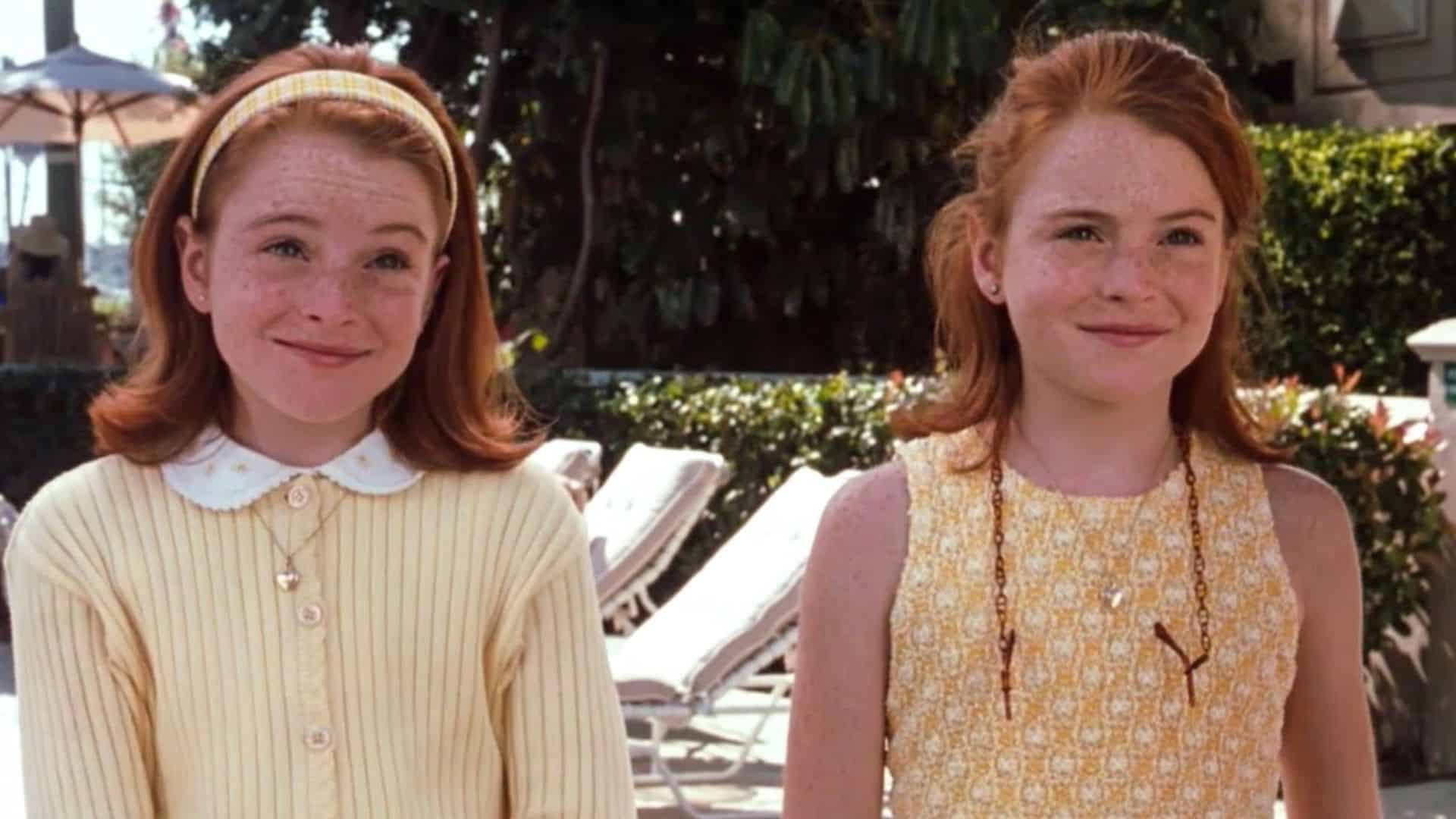 Double Lindsay Lohans posing together in yellow outfits in this image from Walt Disney Pictures.