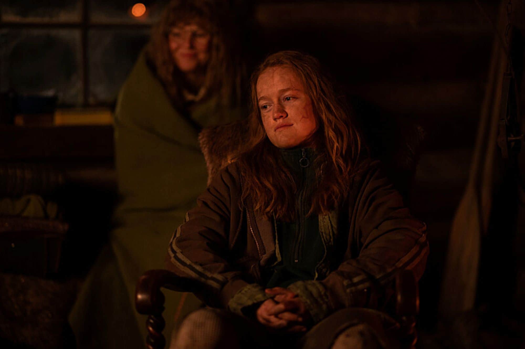 A teenager sits indoors in a darkly lit cabin in this photo by Showtime