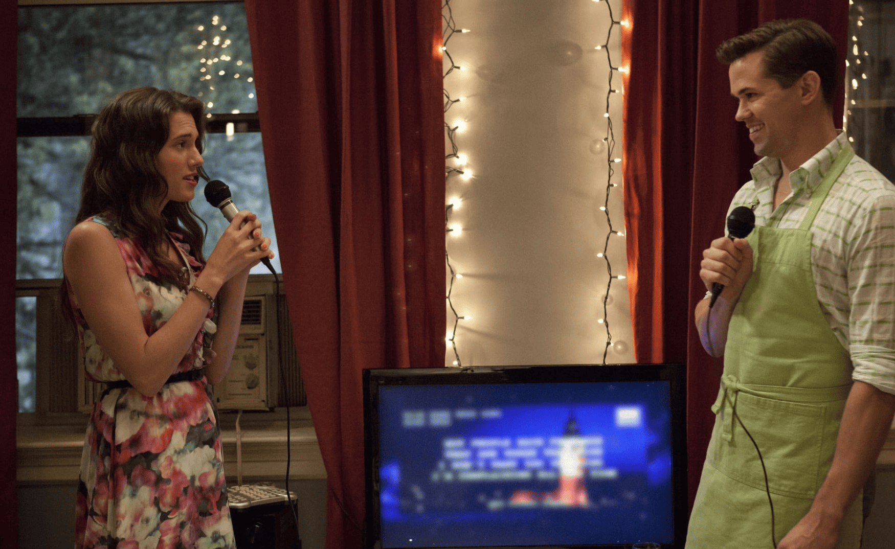 Marnie and Elijah are getting ready for a karaoke duet in this image from Apatow Productions.