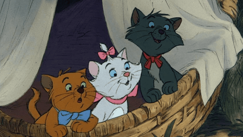 Toulouse, Marie, and Berlioz sitting in a basket looking forward in this image from Walt Disney Animation Studios