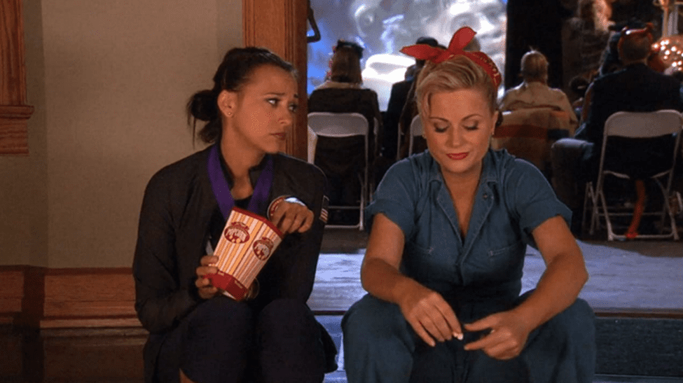 Ann Perkins and Leslie Knope sitting together in “Parks and Recreation”