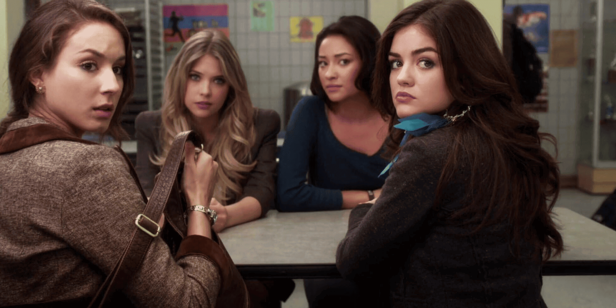 Four teenage girls sit in a school cafeteria in this image from Warner Horizon Television