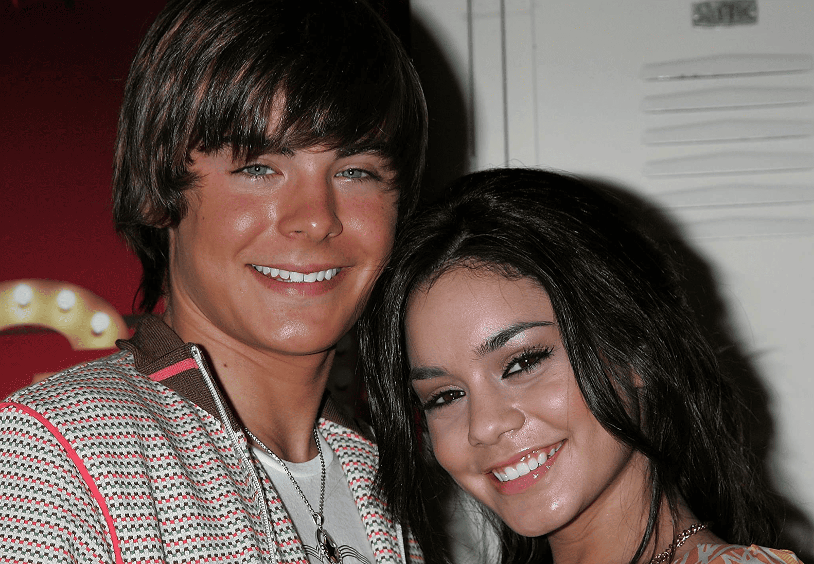 Zac Efron and Vanessa Hudgens smiling in this image from Walt Disney Studios